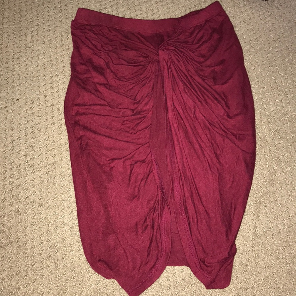 Burgundy skirt.